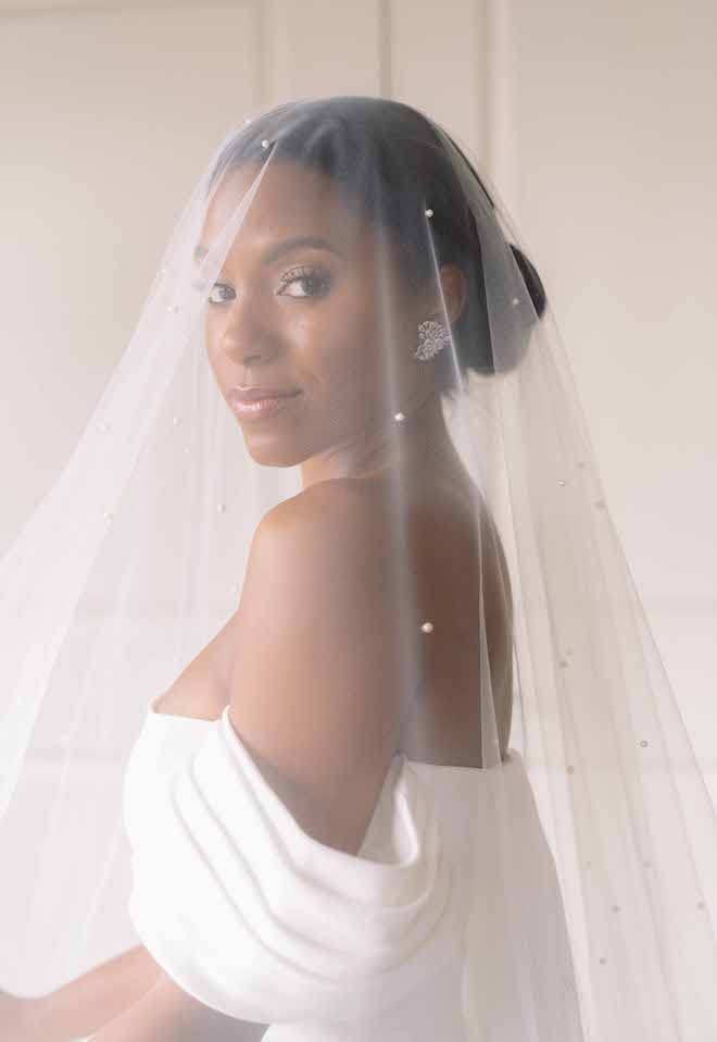 Bride with veil on her wedding day by Stephania Campos in Houston, Texas. 
