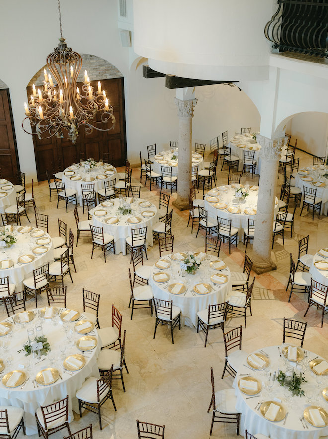 The Bell Tower on 34th's reception space is decorated in blush, gold and white decor and accents. 