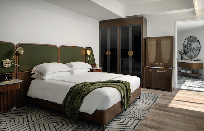 Designer rooms at Thompson Houston with custom bedding and linens. 