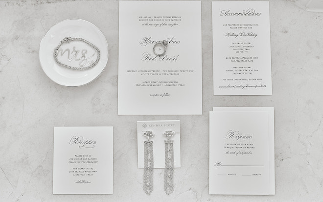Black and white invitation suite with silver jewelry.