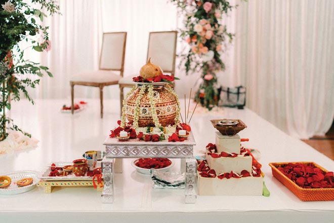 A traditional Hindu ceremony takes place at the Houston wedding venue, The Crystal Ballroom at the Rice.
