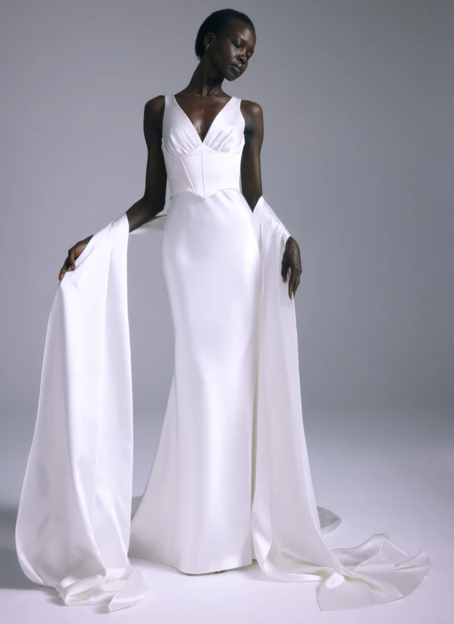 A satin sleeveless wedding gown. 