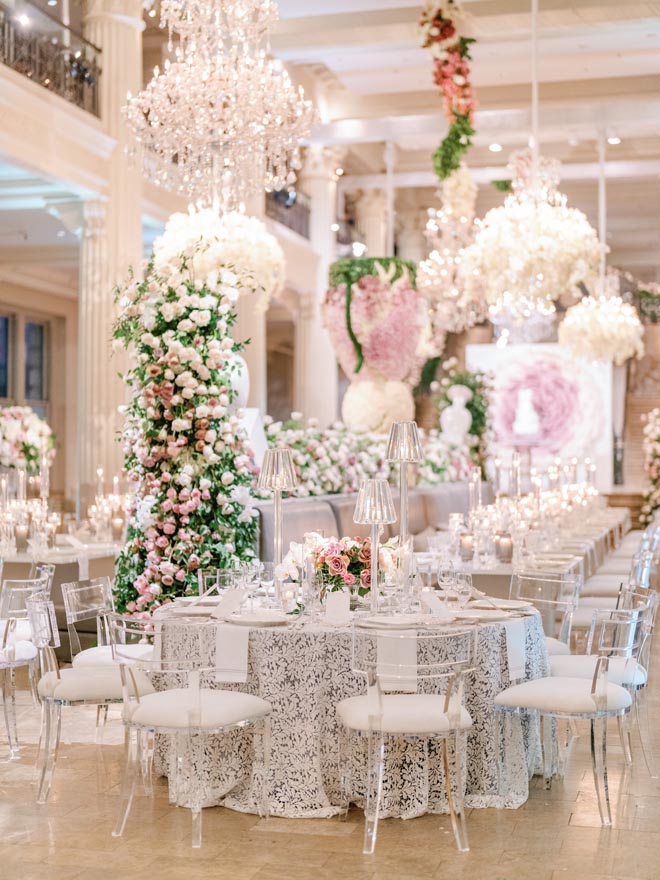 The Corinthian Houston decorated in neutral hues and large floral arrangements. 