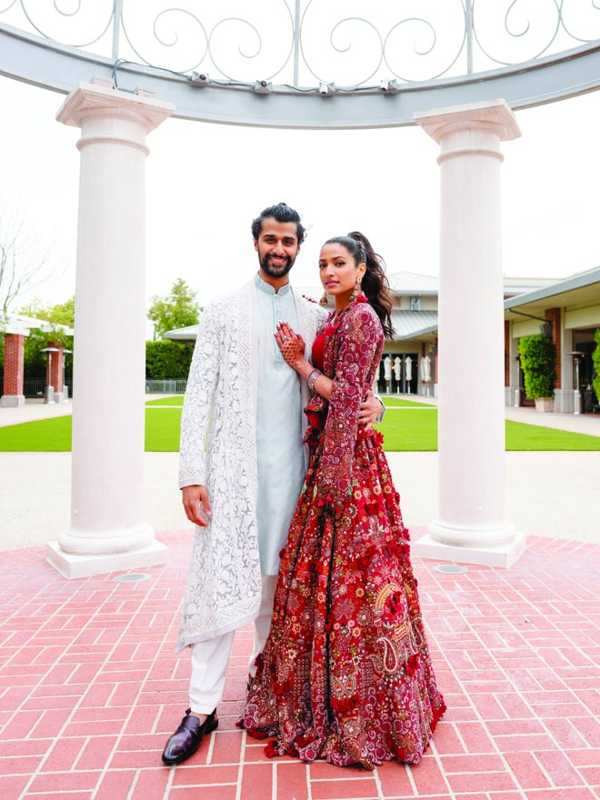 The bride and groom wear tradition Indian wedding attire for their sangeet at the Four Seasons Hotel Westlake Village. 