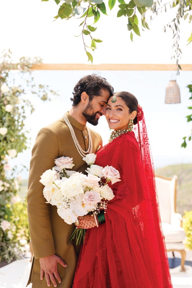 The bride and groom wed with a destination wedding in Malibu. 