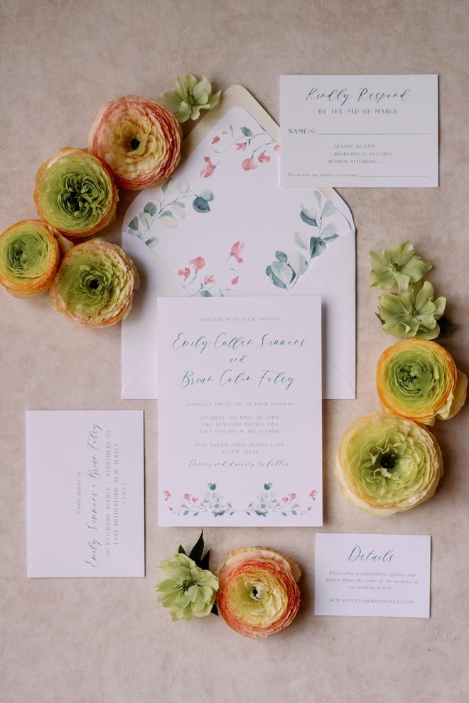 The bride and groom have sage and green wedding stationery and invitations for their Texas hill country wedding.