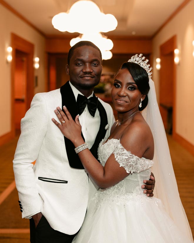 The bride and groom wed with an intimate ballroom wedding captured by Nicole Johanna Photography.