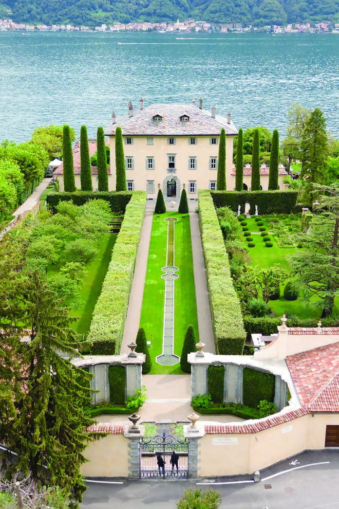 The couple's al fresco wedding day on Lake Como is at the historic Villa Balbiano in Italy. 