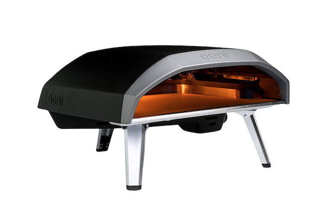 A black and gray portable pizza oven by Ooni. 