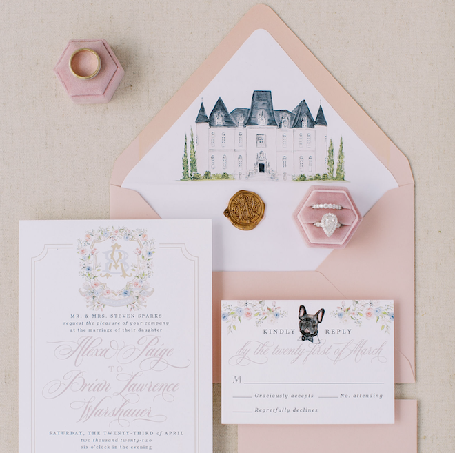 A pink-and-white invitation suite with a black french bulldog on the top of the RSVP card. 