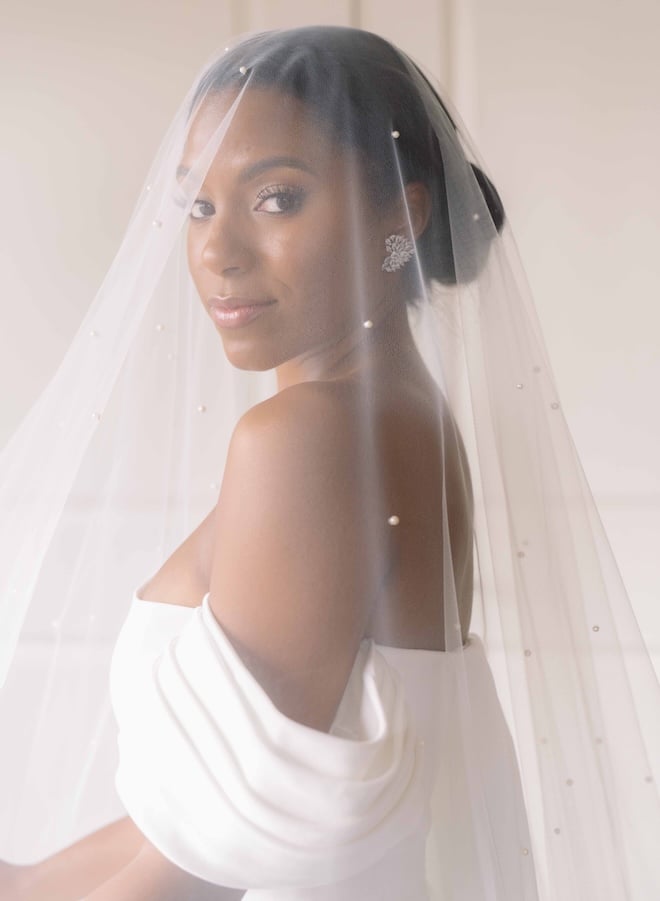 Bride has a wedding day emergency kit on hand with her while getting ready.