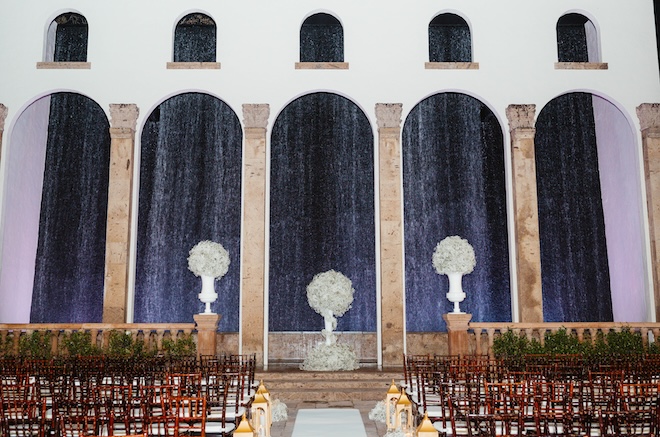 The waterwall decorated for a ceremony with baby's breath.