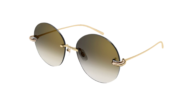 Round gold sunglasses by Cartier. 