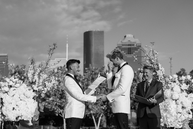 Walker wiping a tear at the altar as Ben reads his vows. 