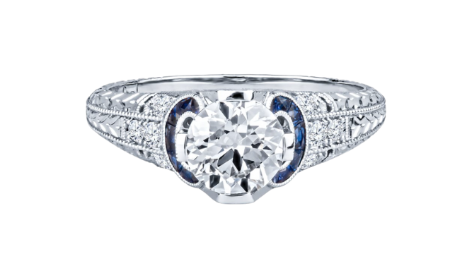 Round diamond and sapphire accent engagement ring available at Shaftel Diamonds.