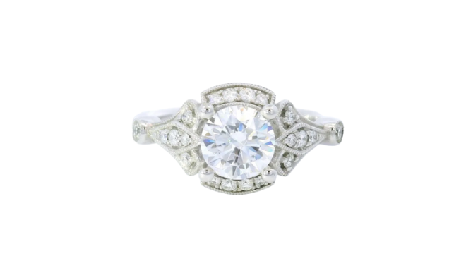 Round center diamond engagement ring from Thomas Markle Jewelers. 