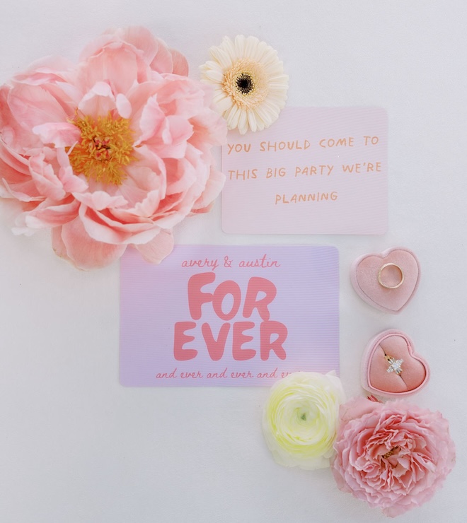 Purple, pink and orange stationery that says "you should come to this big party we're planning" and "Avery & Austin for ever and ever and ever and ever."