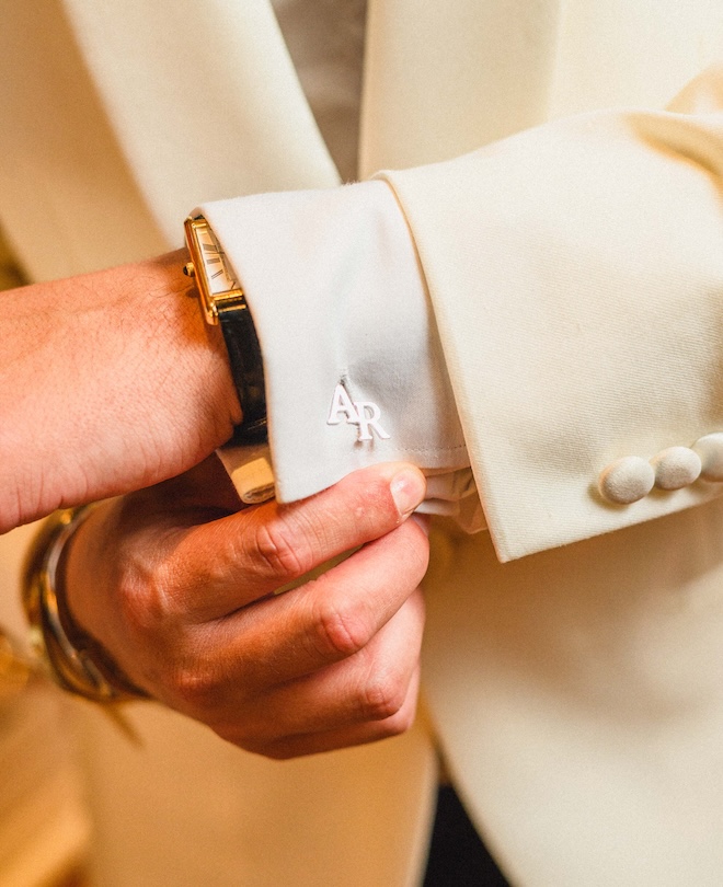 The grooms cufflinks with the initials "AR".