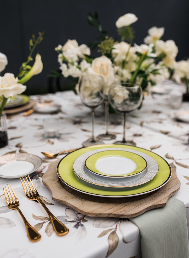 Green flatware and golf silverware are placed at the table. 