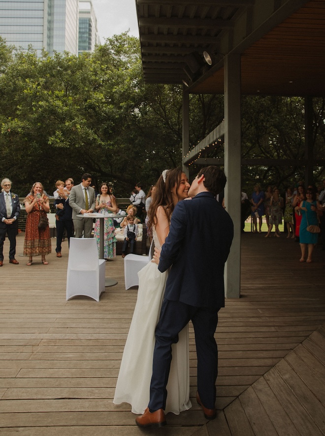 The bride and groom dancing on the deck at The Grove. 