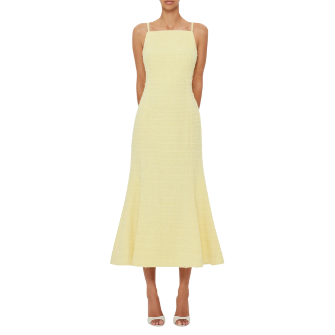 A tweed yellow midi dress for a cocktail wedding attire. 