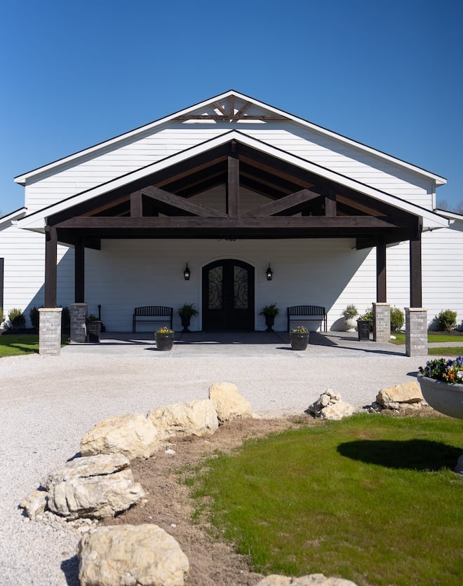 Venue 311 is a white barn wedding venue located north of Houston. 