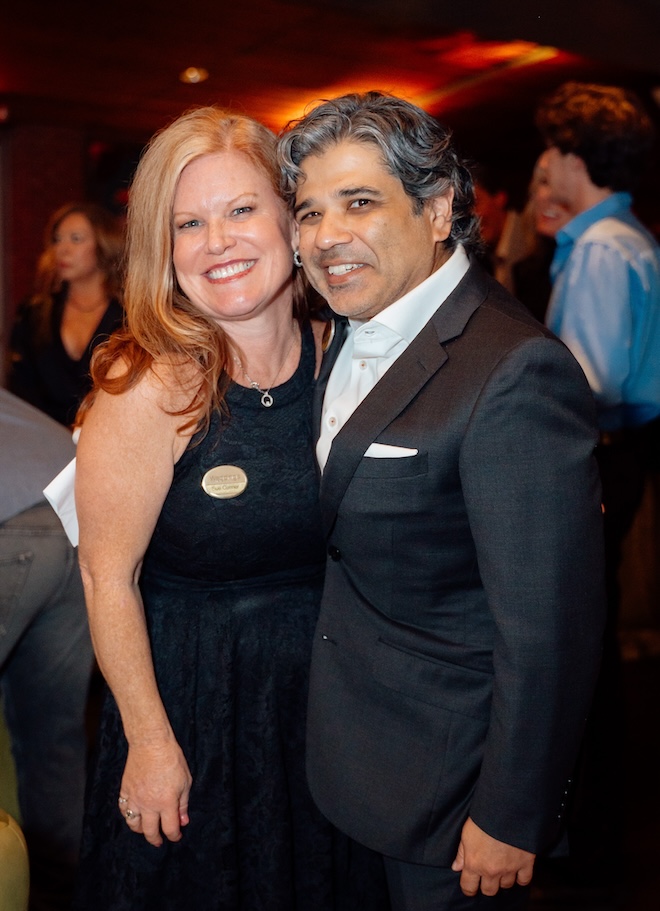 Vik and Sue from the Weddings in Houston team smiling for a photo. 