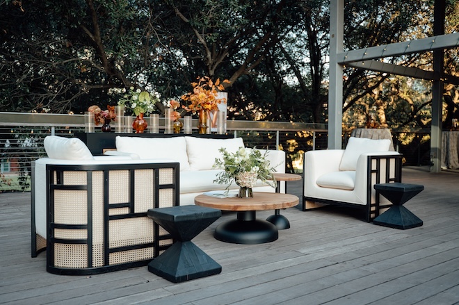 White and black lounge seating on the second floor of The Grove. 
