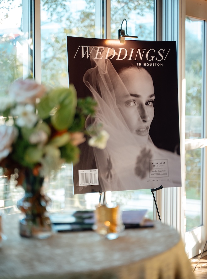 The December 2025 cover on display at the client appreciation party. 