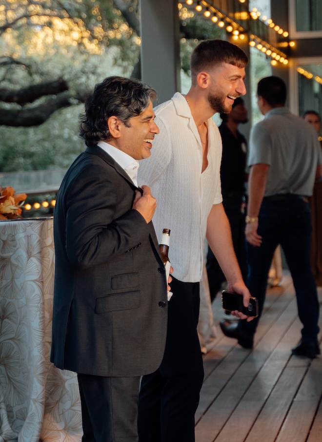 Our publisher Vik Day and Yuval Miller from Caesar Event Rentals laughing.