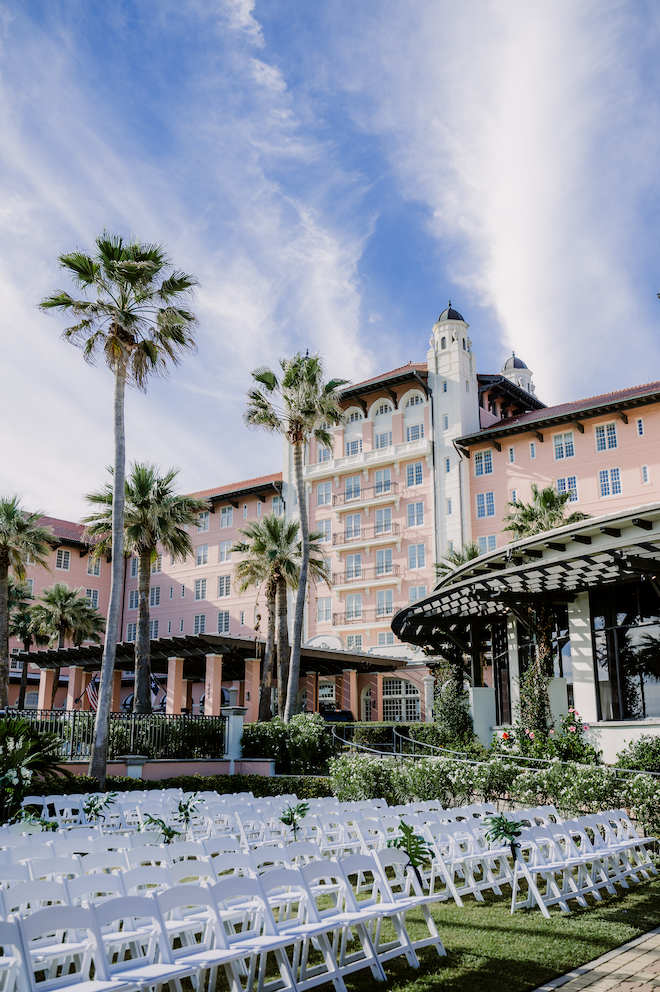 Outside view of venue showing the white chairs for ceremony.