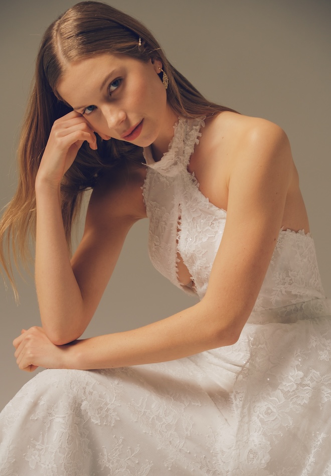A lace wedding gown with a halter neckline. 