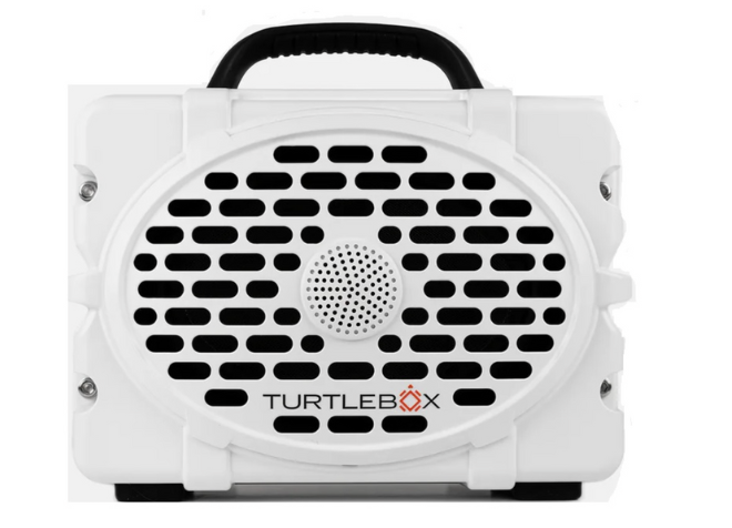 A white turtle box speaker for newlywed holiday gift guide.