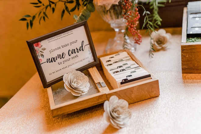 A library card inspired seating chart. 