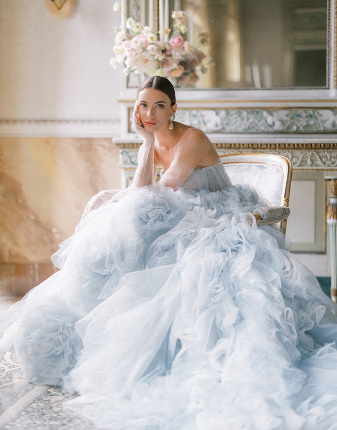 The bride wears a blue gown for an editorial in Italy.