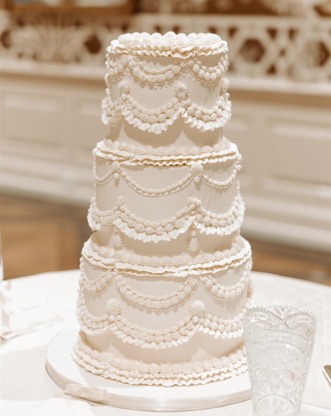 A vintage-style white cake by Cakes by Gina. 