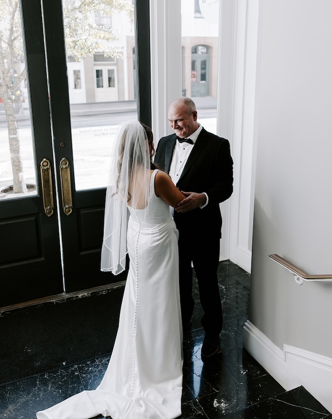 The bride and her father share a private first look before the ceremony. 