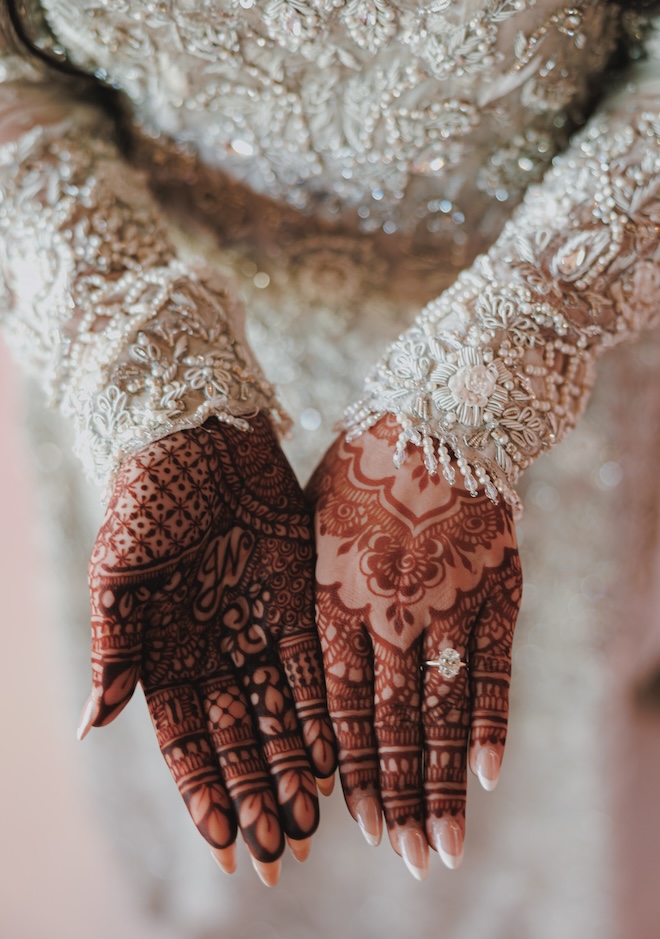 The bride's henna and engagement ring. 