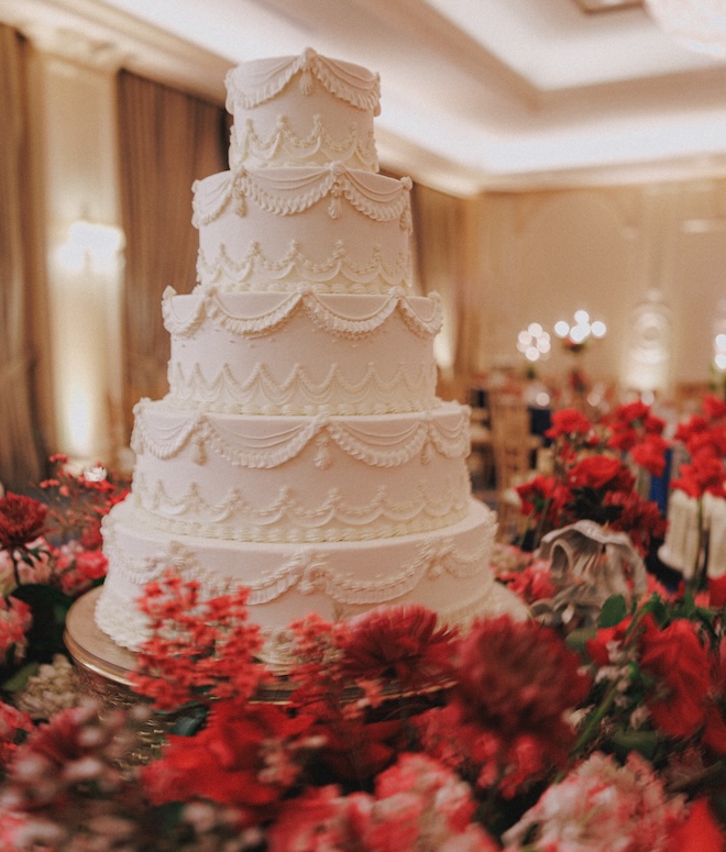 A five-tier vintage cake inspired by Beauty and the Beast. 