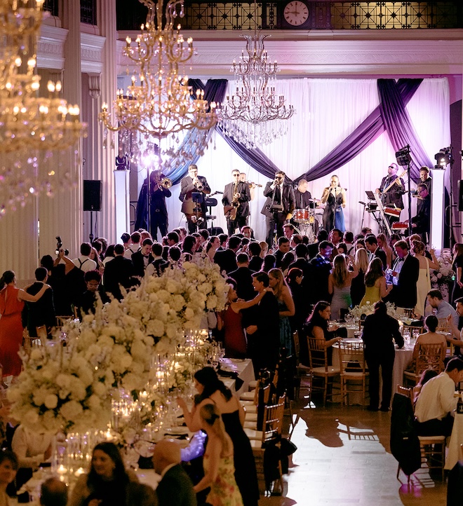 The packed dancefloor with the band performing. 