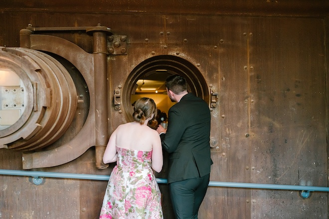 Guests looking into The Vault at Corinthian Houston. 