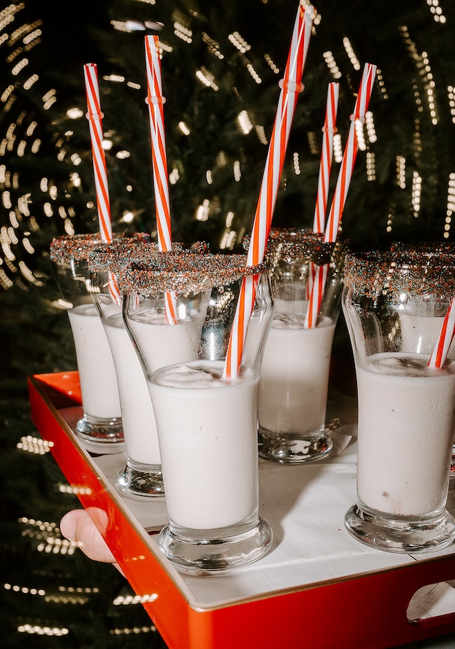 Milkshakes with red and white stripped straws are served at the wedding reception. 