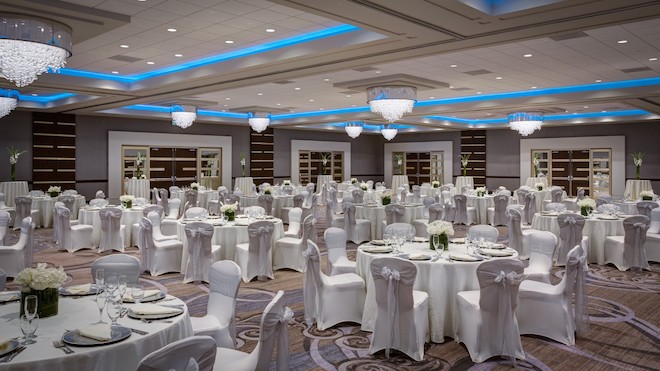 Blue, grey and white detailed reception ballroom.