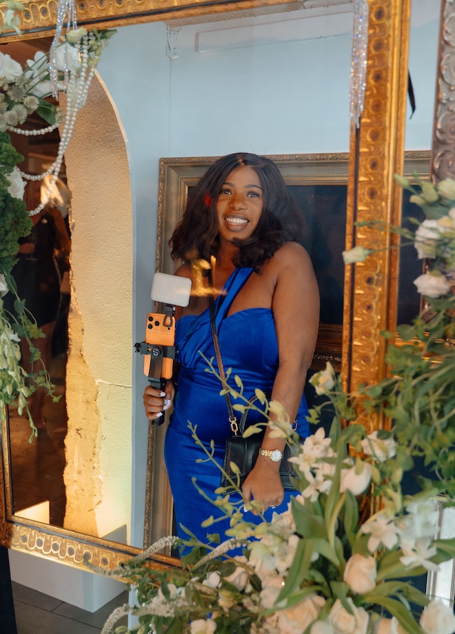 Content Creator Kuni, posing in the photobooth. 