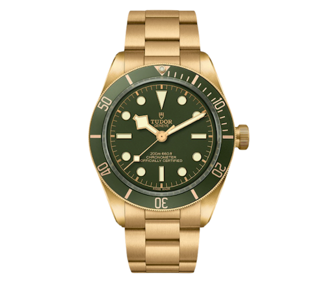 A gold Tudor watch with a green face is available at Deutsch Fine Jewelry. 