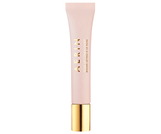 Rose lip conditioner by Aerin is in a pink and gold tube.