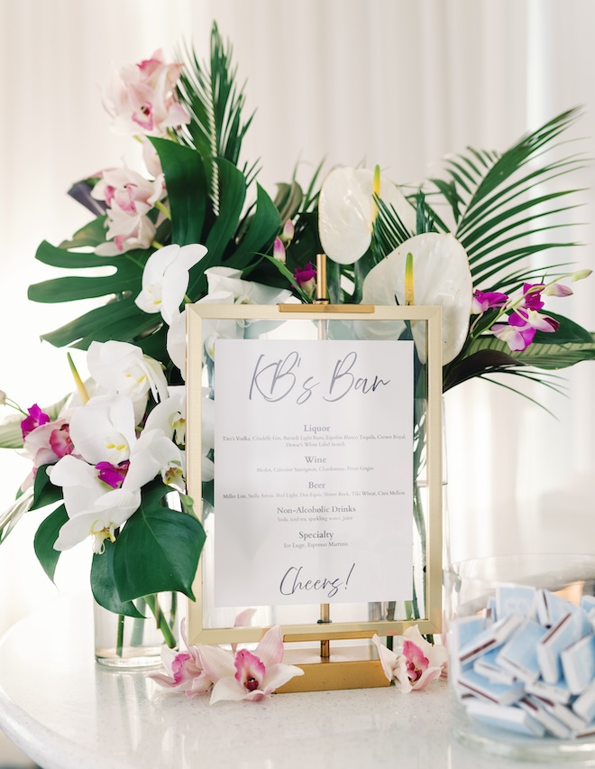 Bar menu for tropical Galveston wedding style with purple and green accents.