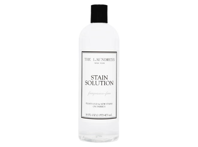 The Laundress stain solution black and white bottle. 