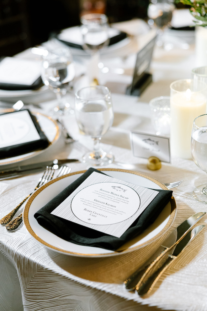 Black and white detailed reception table setting.