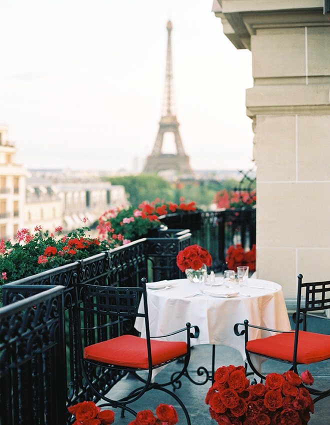 Red ranunculus decorate the terrace. 